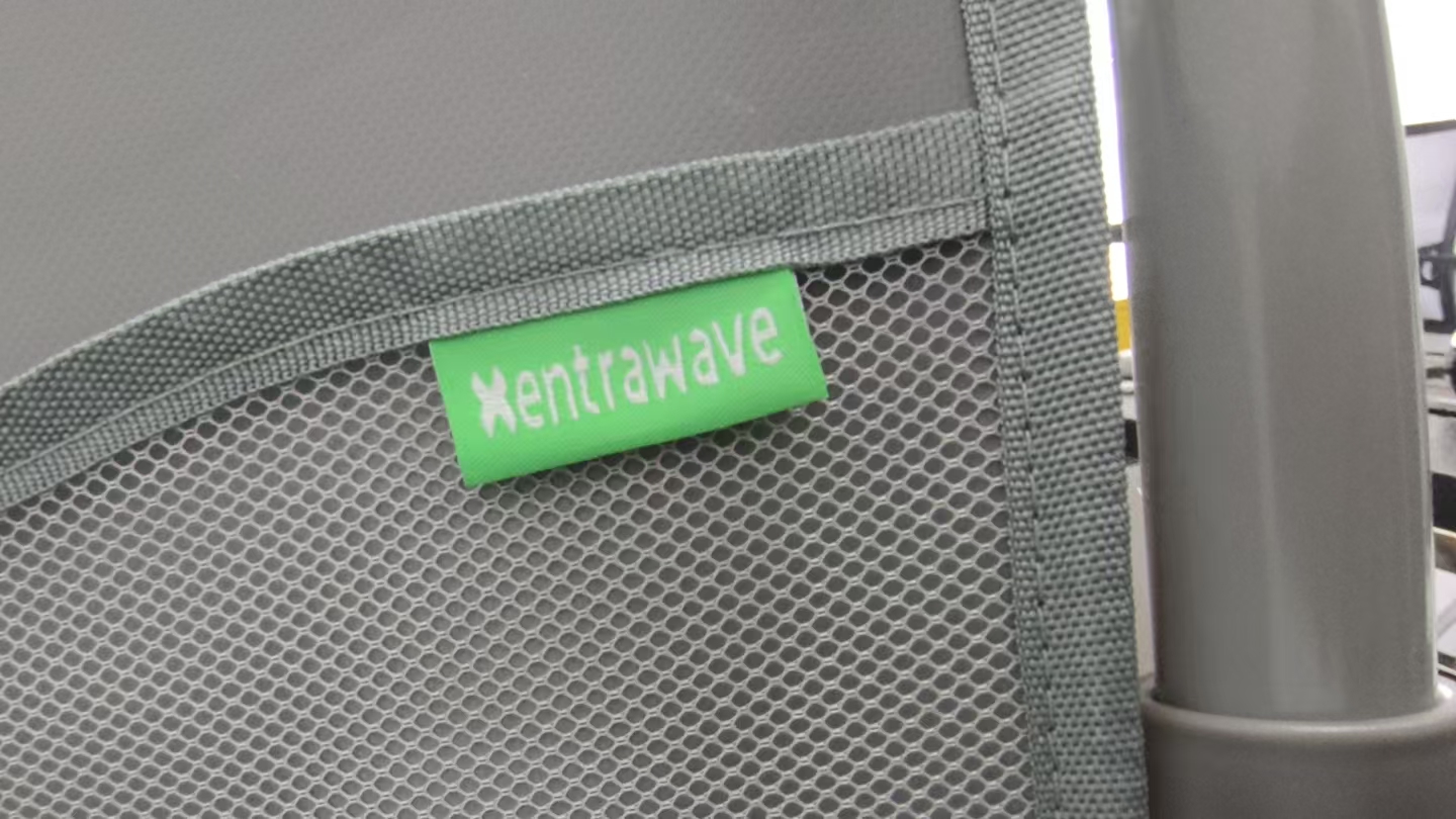 Woven brand label sewn onto a patient lift